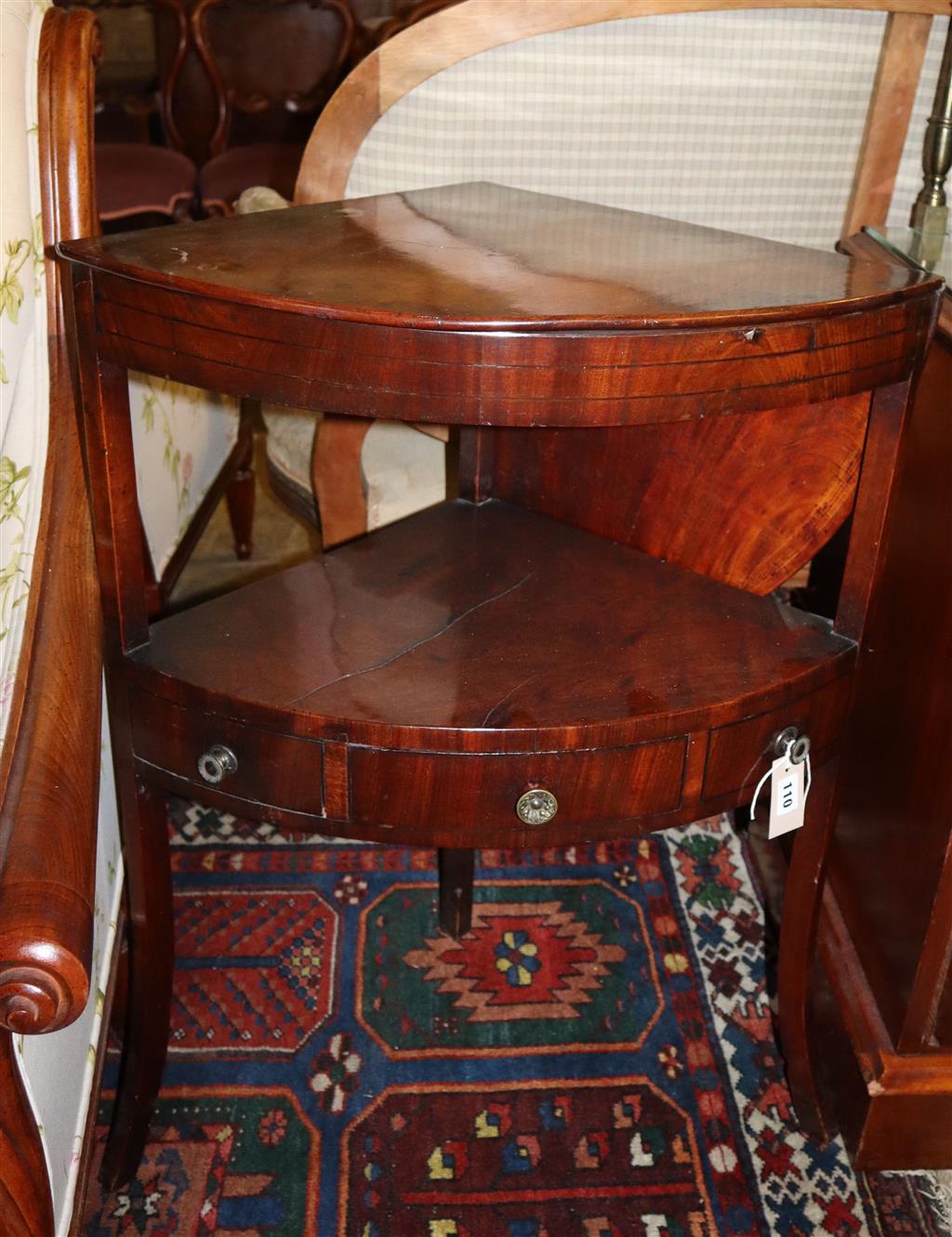 A George III mahogany bow front corner washstand, width 62cm, depth 44cm, height 82cm